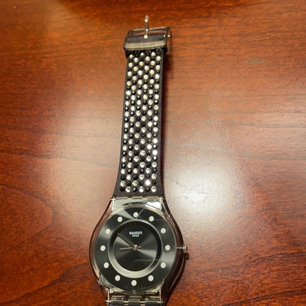 Swatch black crystals watch.
